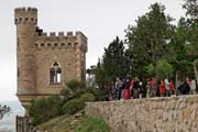 Rennes le Chateau  - Tour Magdal and tourists performing a spiritual excercise